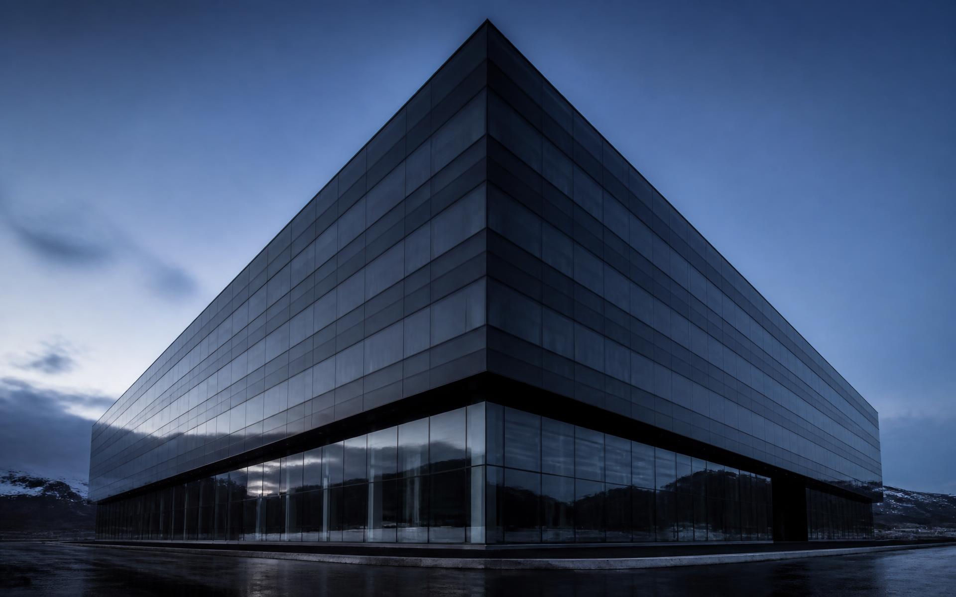 Moderne Schweizer Glas- und Stahlarchitektur in der blauen Stunde